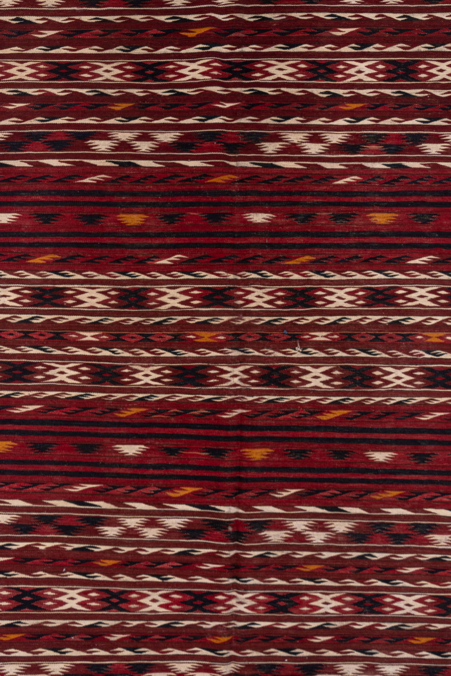 4' x 9' one-of-a-kind handmade vintage Kilim runner rug. Color palette: rust, burgundy, ivory, charcoal, gold, mahogany