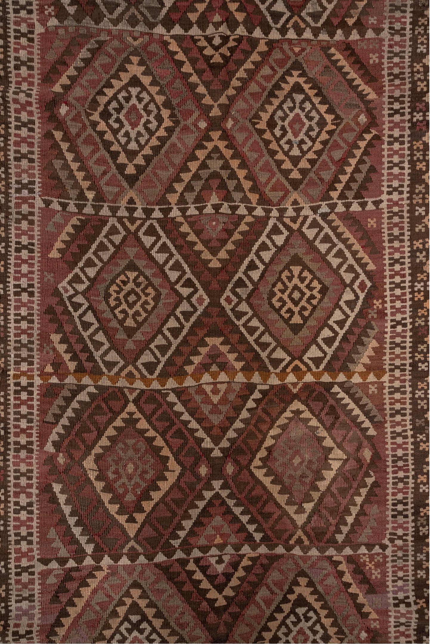 4' x 11' one-of-a-kind handmade vintage Kilim runner rug. Color palette: rose, rust, brown, ivory, taupe, mauve, pink, red