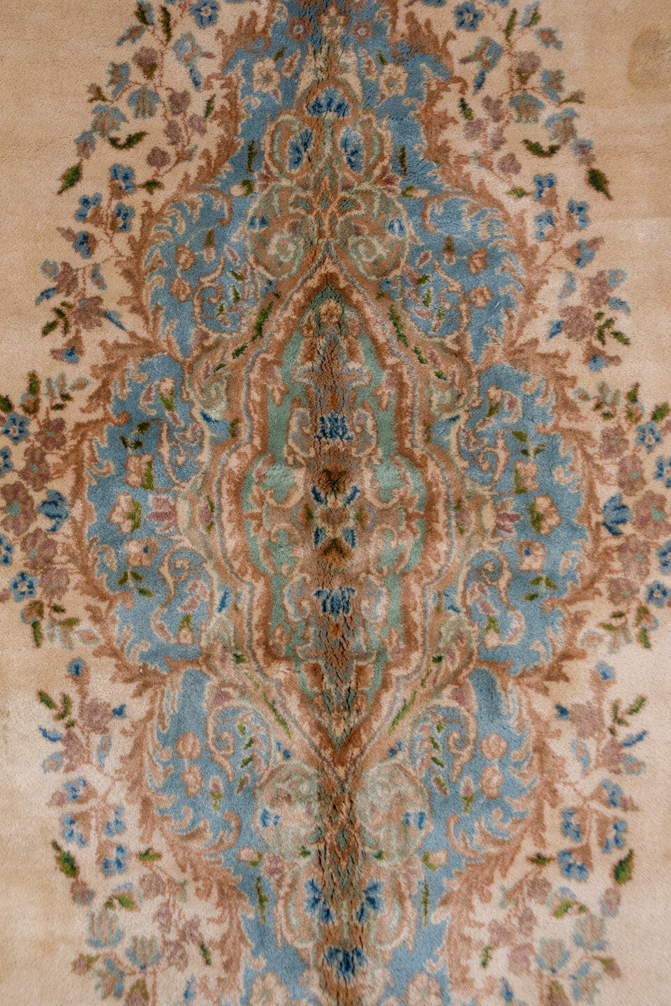 9' x 18' one-of-a-kind handmade vintage Kerman rug. Color palette: ivory, sky blue, beige, taupe, camel, slate, light blue