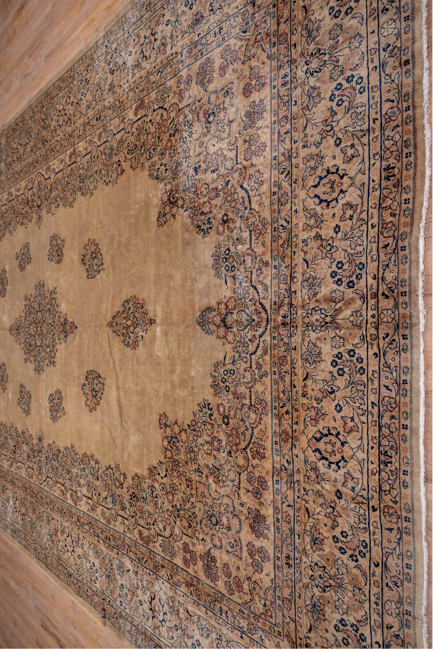 12' x 18' one-of-a-kind handmade antique Sarouk oversize rug. Color palette: beige, ivory, slate, taupe, rust, camel