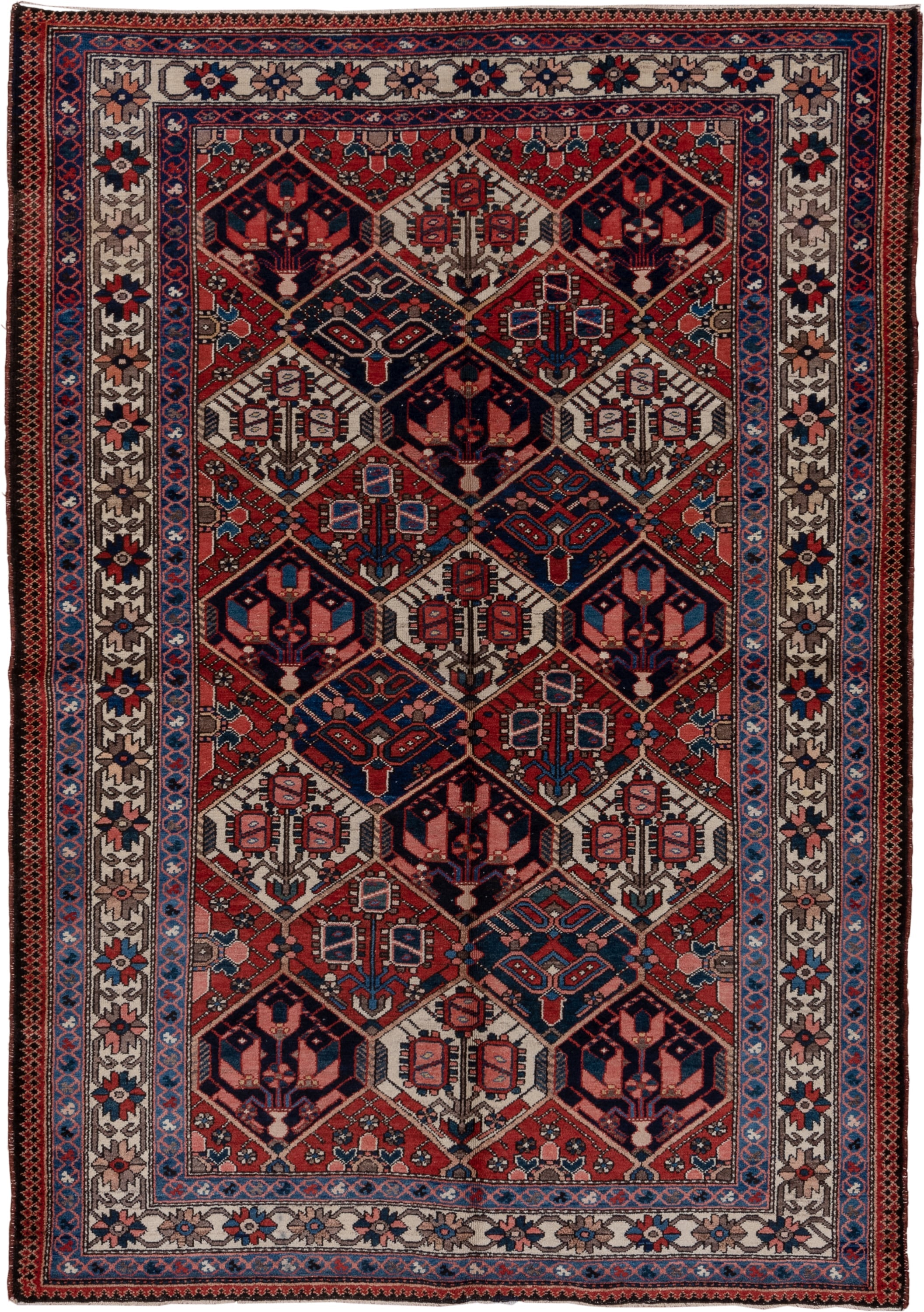 5' x 7' one-of-a-kind handmade antique Baktiary rug. Color palette: rust, ivory, navy, sky_blue, rose, charcoal, slate