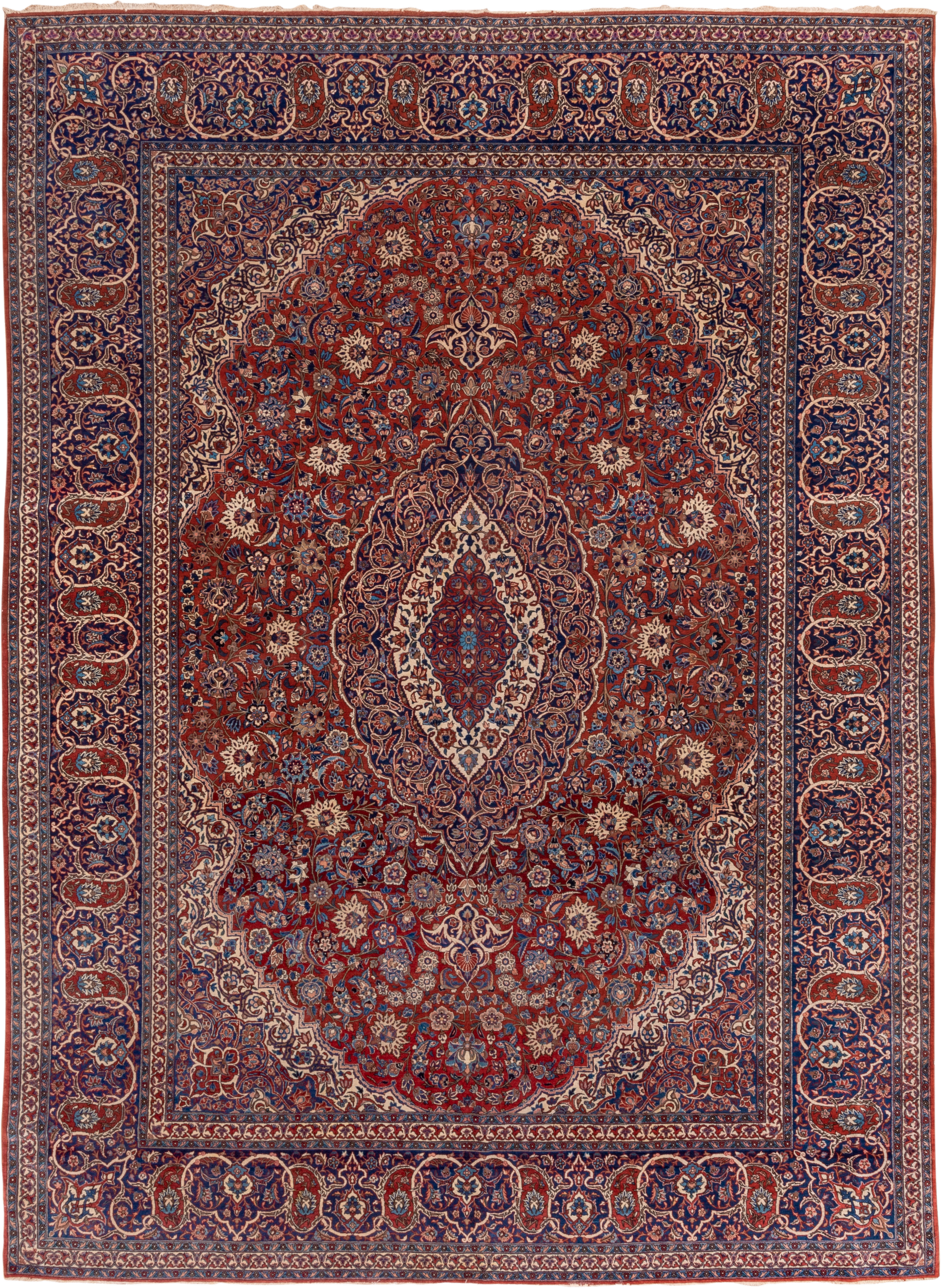 10' x 13' one-of-a-kind handmade antique Isfahan large size rug. Color palette: navy, rust, ivory, crimson, cobalt, camel