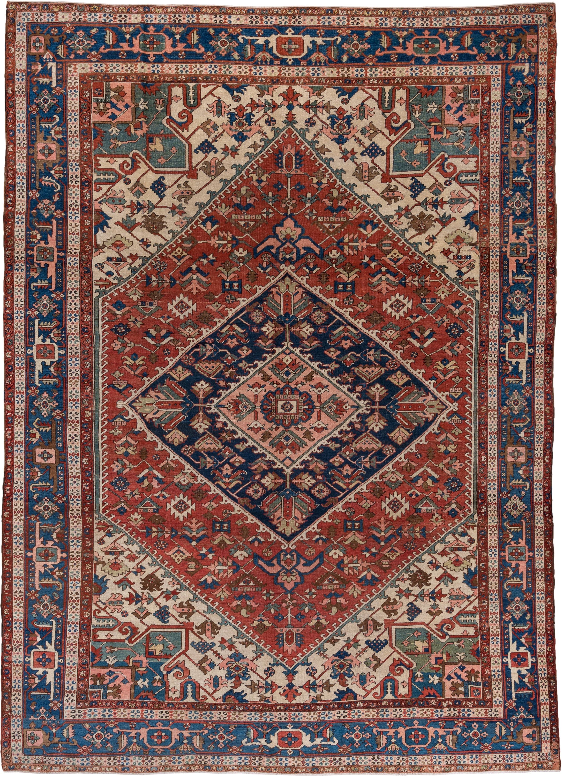 10' x 14' one-of-a-kind handmade antique Serapi large size rug. Color palette: rust, ivory, indigo, sky blue, rose, taupe