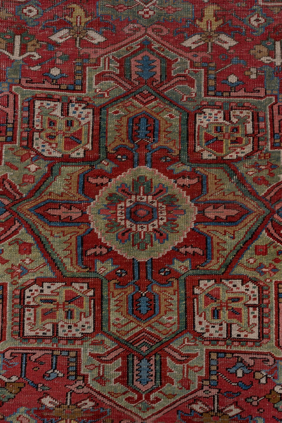 6' x 8' one-of-a-kind handmade antique Heriz medium size rug. Color palette: rust, sage, ivory, navy, rose, taupe, slate