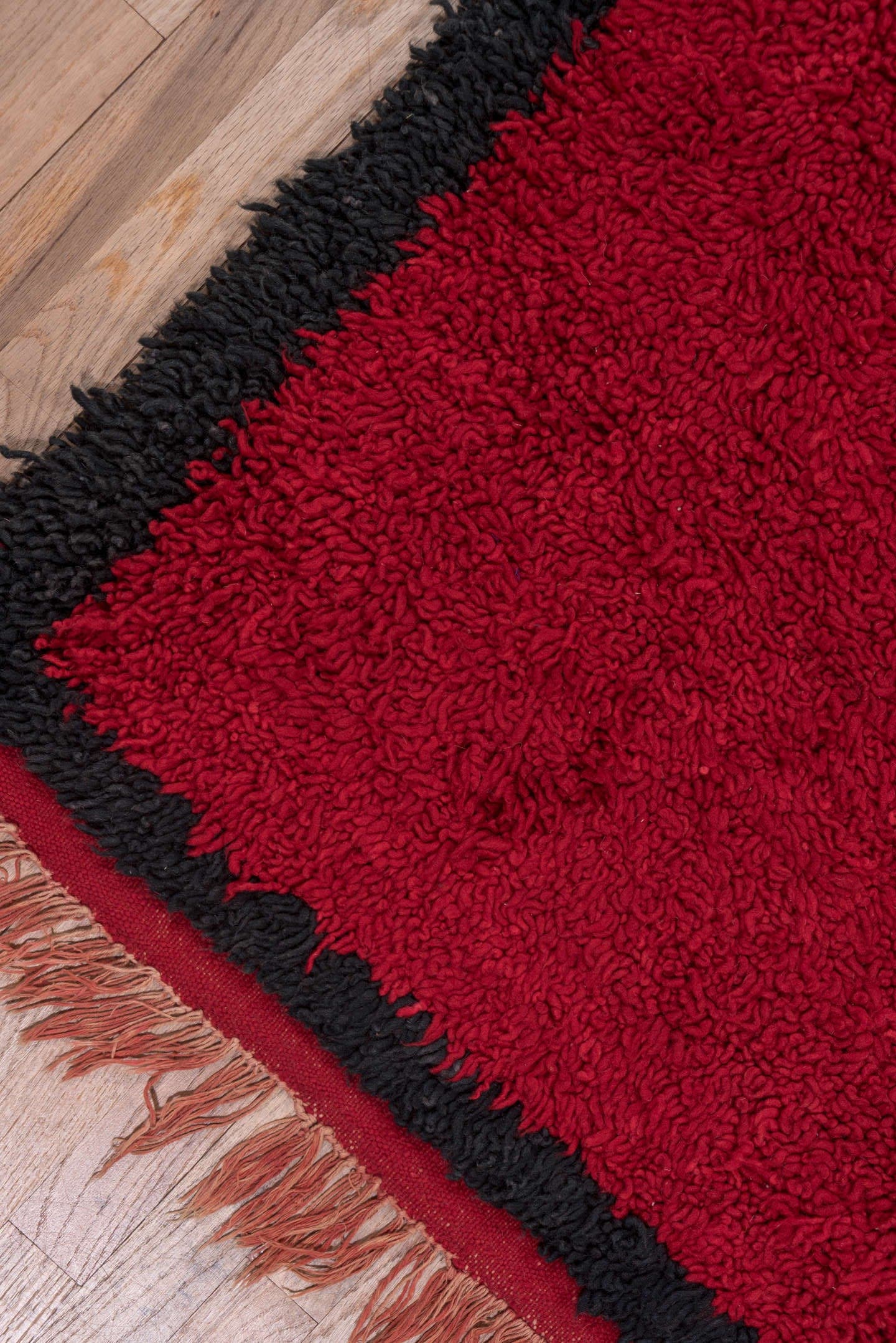 3' x 10' one-of-a-kind handmade vintage Moroccan runner rug. Color palette: crimson, black, mahogany, red, brown