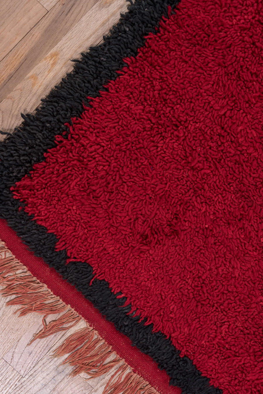 3' x 10' one-of-a-kind handmade vintage Moroccan runner rug. Color palette: crimson, black, mahogany, red, brown