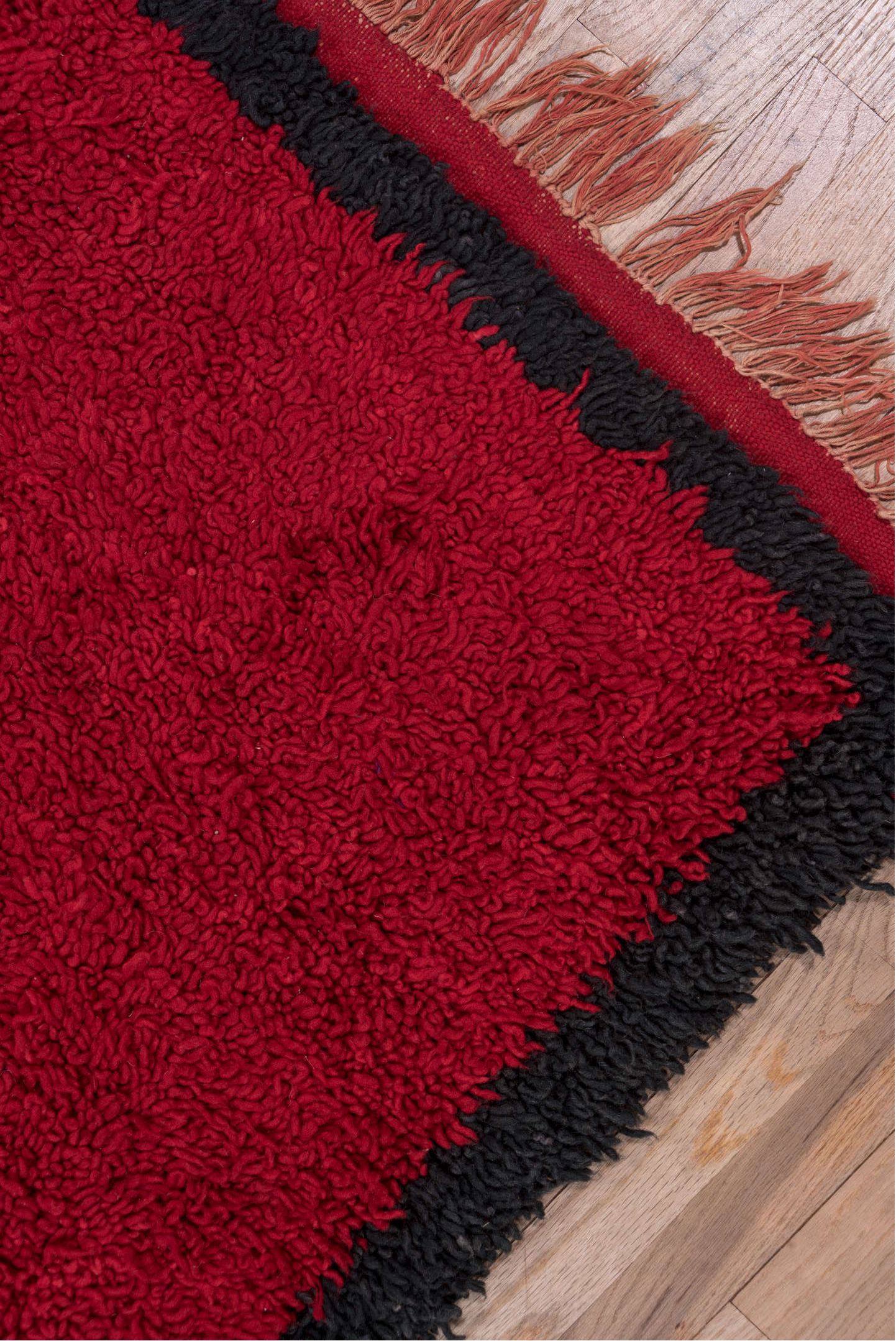 3' x 10' one-of-a-kind handmade vintage Moroccan runner rug. Color palette: black, brown, crimson, gray, off-white, pink