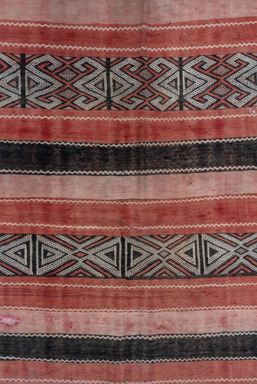 5' x 8' one-of-a-kind handmade vintage Jijim medium size rug. Color palette: rose, blush, charcoal, ivory, dusty pink, pink