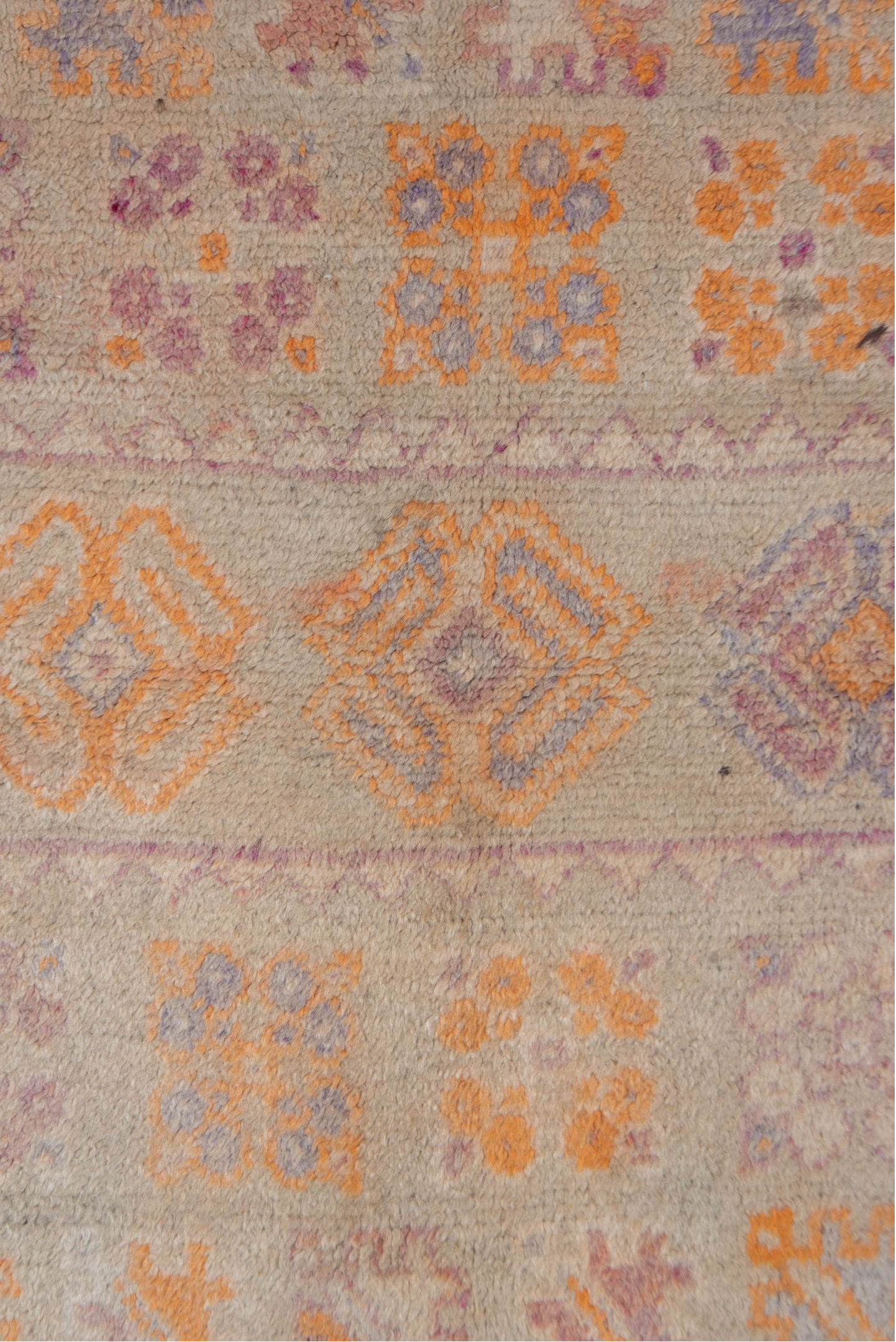 3' x 5' one-of-a-kind handmade vintage Moroccan small size rug. Color palette: ivory, saffron, taupe, rose, lavender, brown