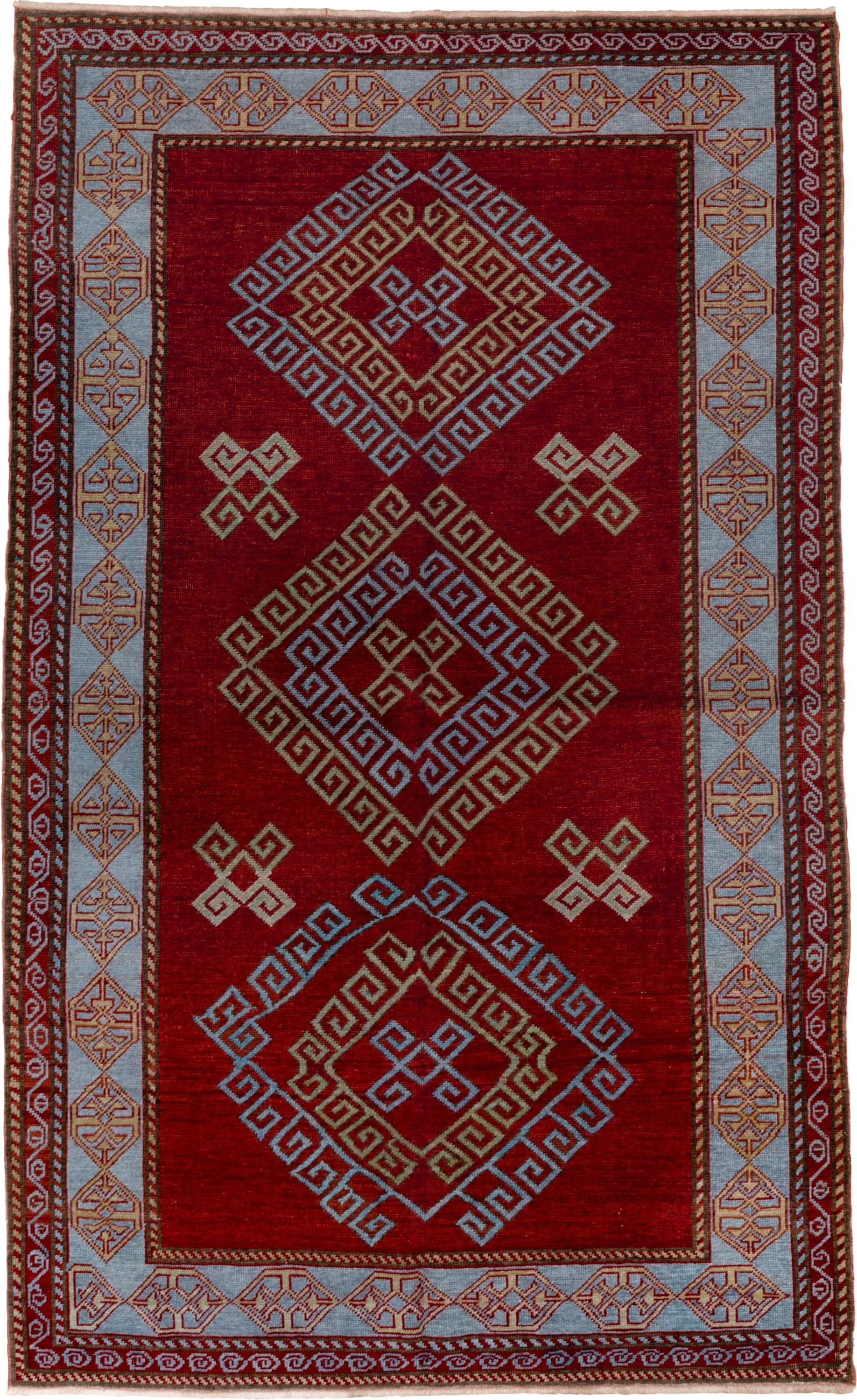 4' x 6' one-of-a-kind handmade vintage Caucasian small size rug. Color palette: red, ivory, sky blue, rust, burgundy, camel