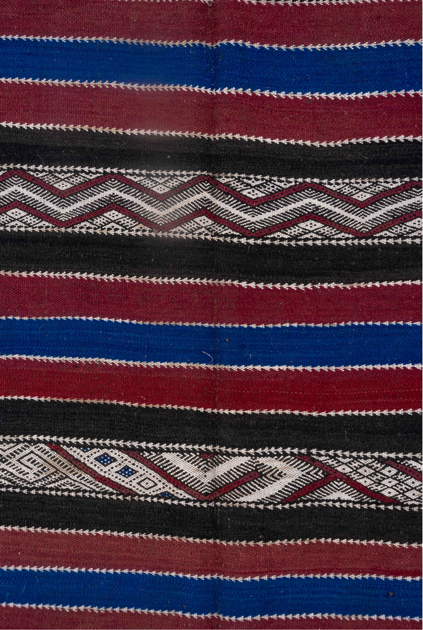 5' x 11' one-of-a-kind handmade vintage Kilim runner rug. Color palette: black, blue, brown, dark gray, gray, light gray