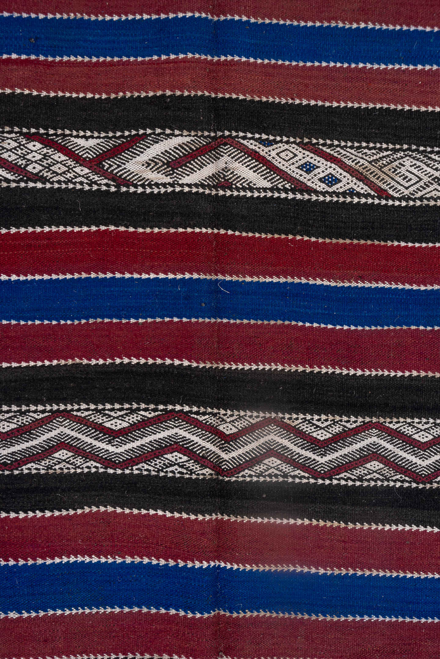 5' x 11' one-of-a-kind handmade vintage Kilim runner rug. Color palette: black, burgundy, indigo, ivory, gray, purple