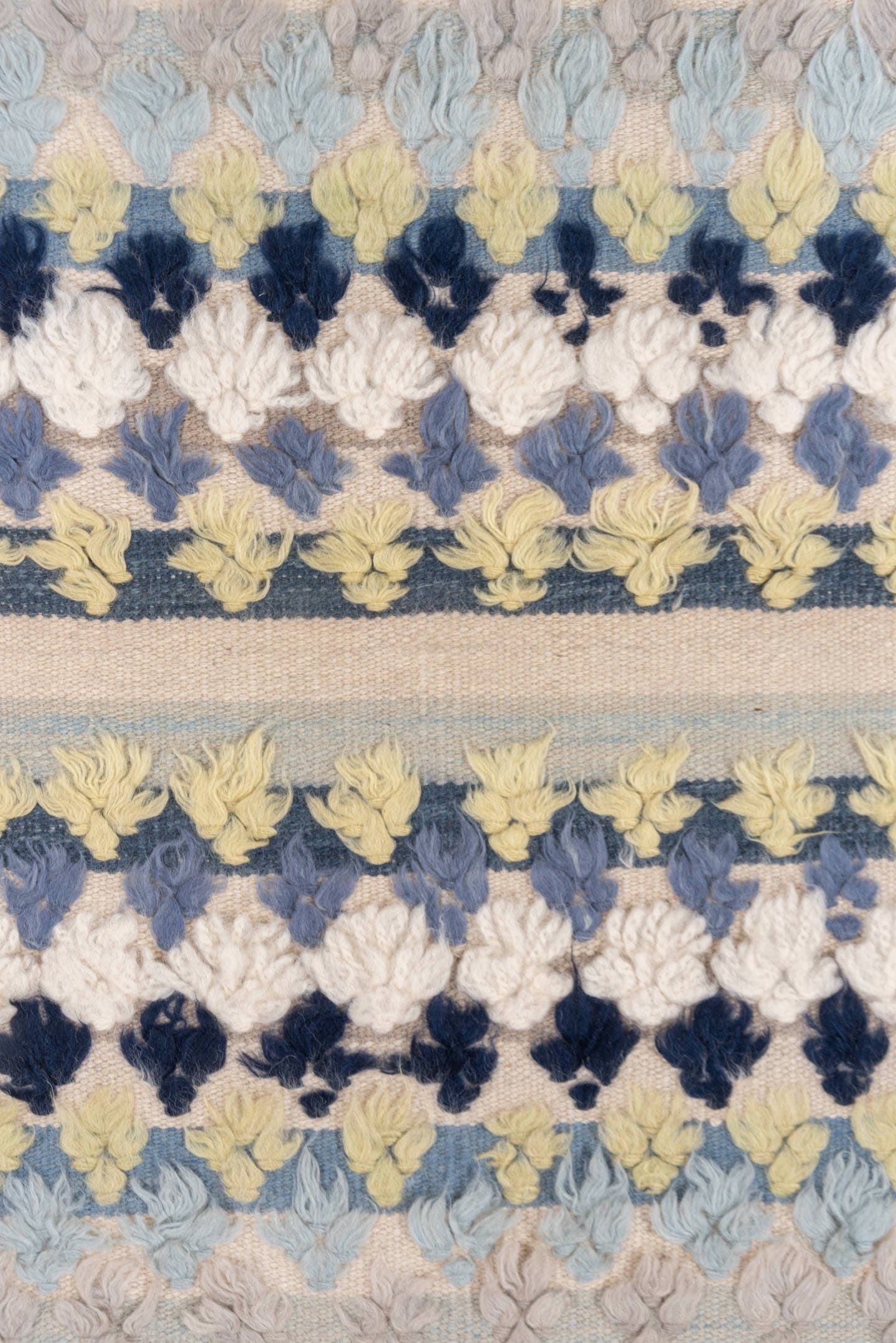 3' x 6' one-of-a-kind handmade vintage Tulu small size rug. Color palette: ivory, pale blue, taupe, navy, butter yellow