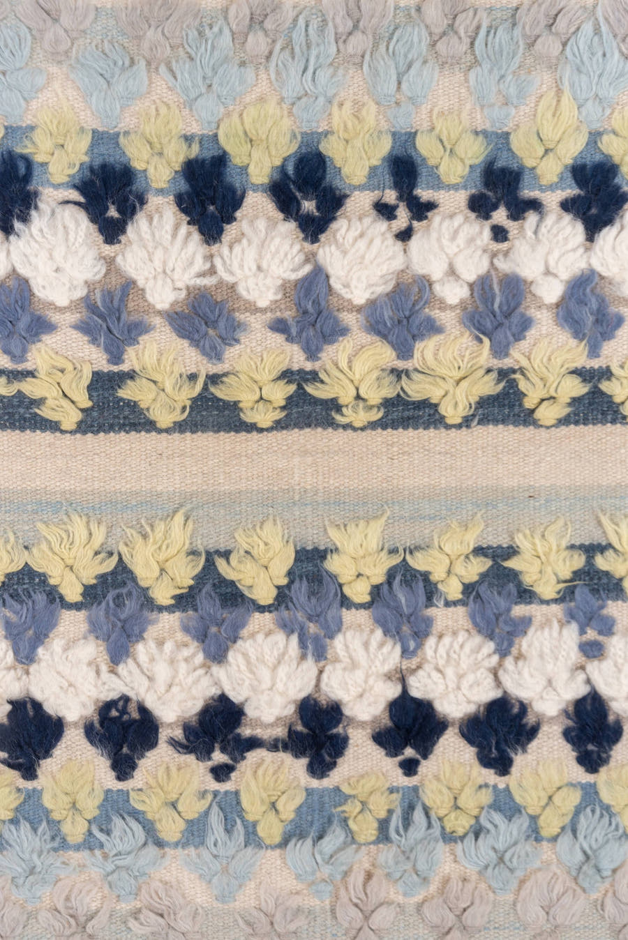 3' x 6' one-of-a-kind handmade vintage Tulu small size rug. Color palette: ivory, pale blue, taupe, navy, butter yellow