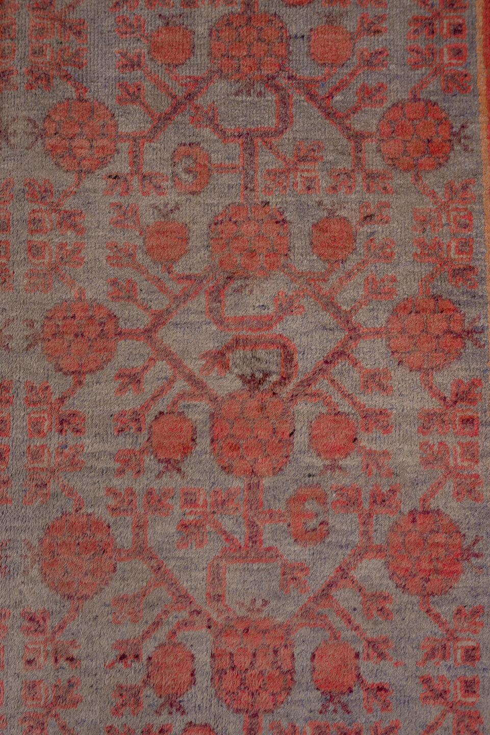 5' x 10' one-of-a-kind handmade vintage Khotan medium size rug. Color palette: rose, rust, taupe, terra cotta, dusty blue