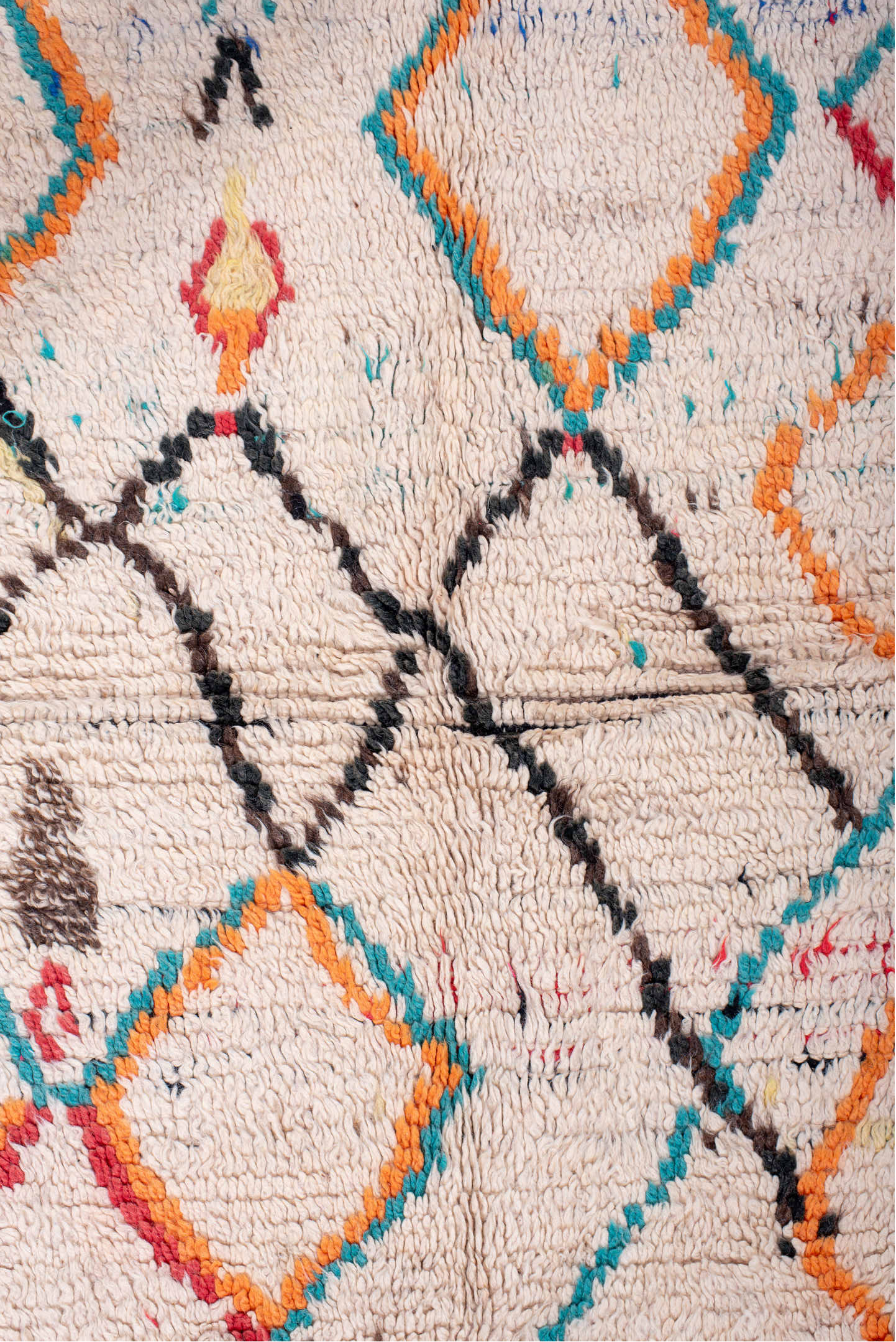 4' x 6' one-of-a-kind handmade vintage Moroccan small size rug. Color palette: ivory, turquoise, charcoal, orange, red, blue
