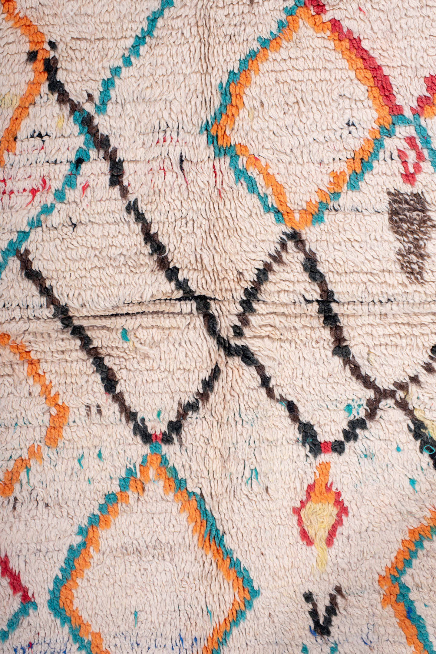 4' x 6' one-of-a-kind handmade vintage Moroccan small size rug. Color palette: ivory, turquoise, charcoal, orange, red, blue