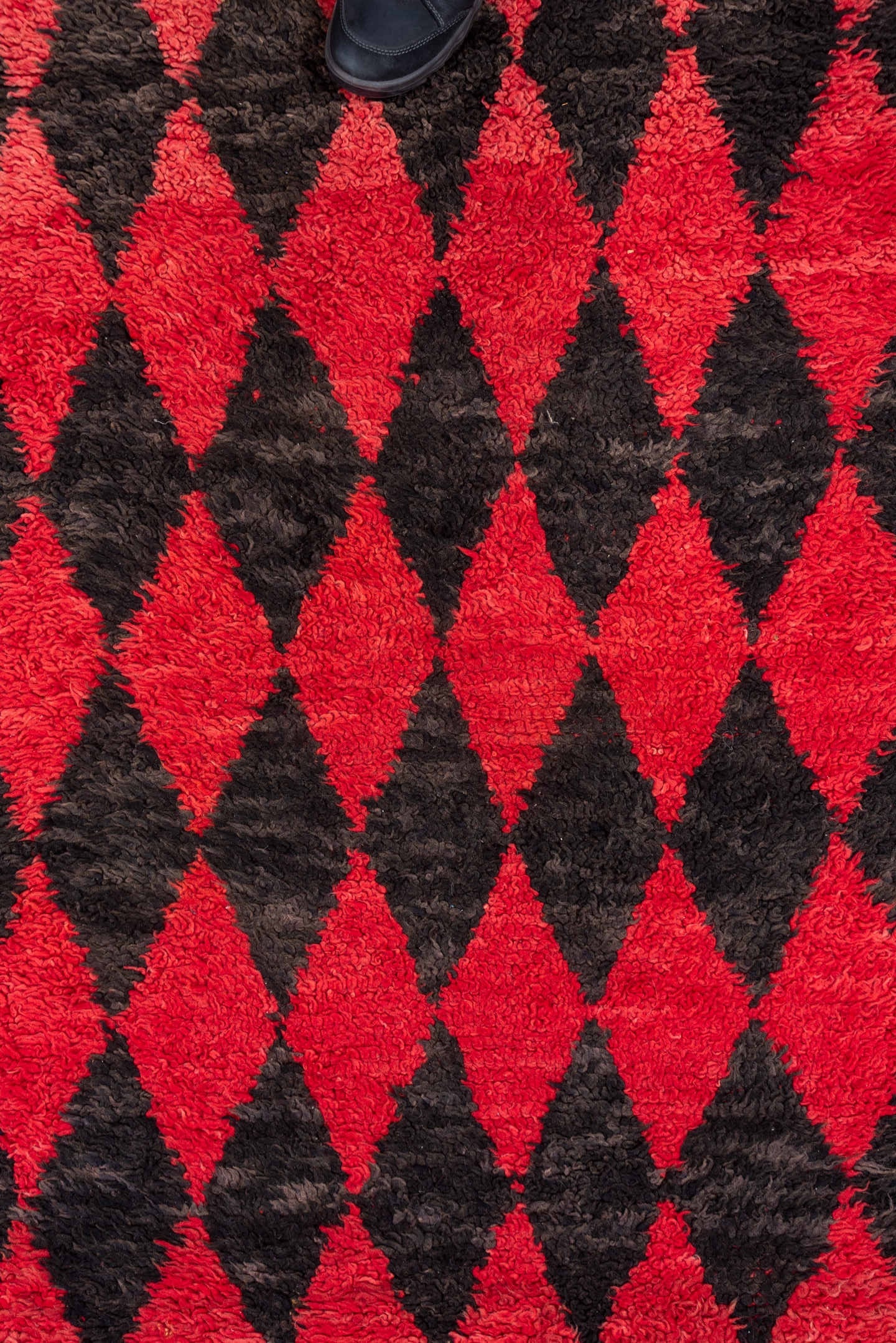 3' x 11' one-of-a-kind handmade vintage Moroccan runner rug. Color palette: crimson, charcoal, rose, red, gray, black, pink