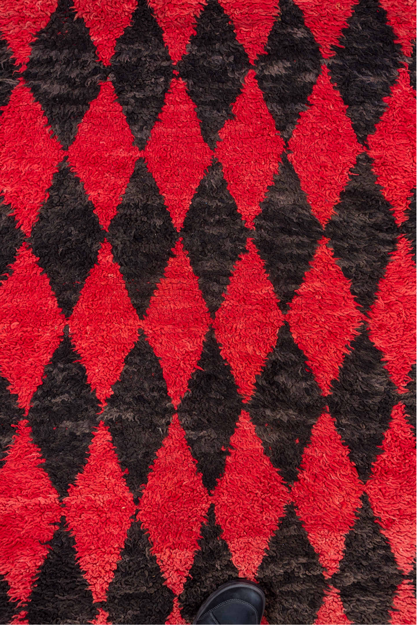 3' x 11' one-of-a-kind handmade vintage Moroccan runner rug. Color palette: crimson, charcoal, rose, red, gray, black, pink