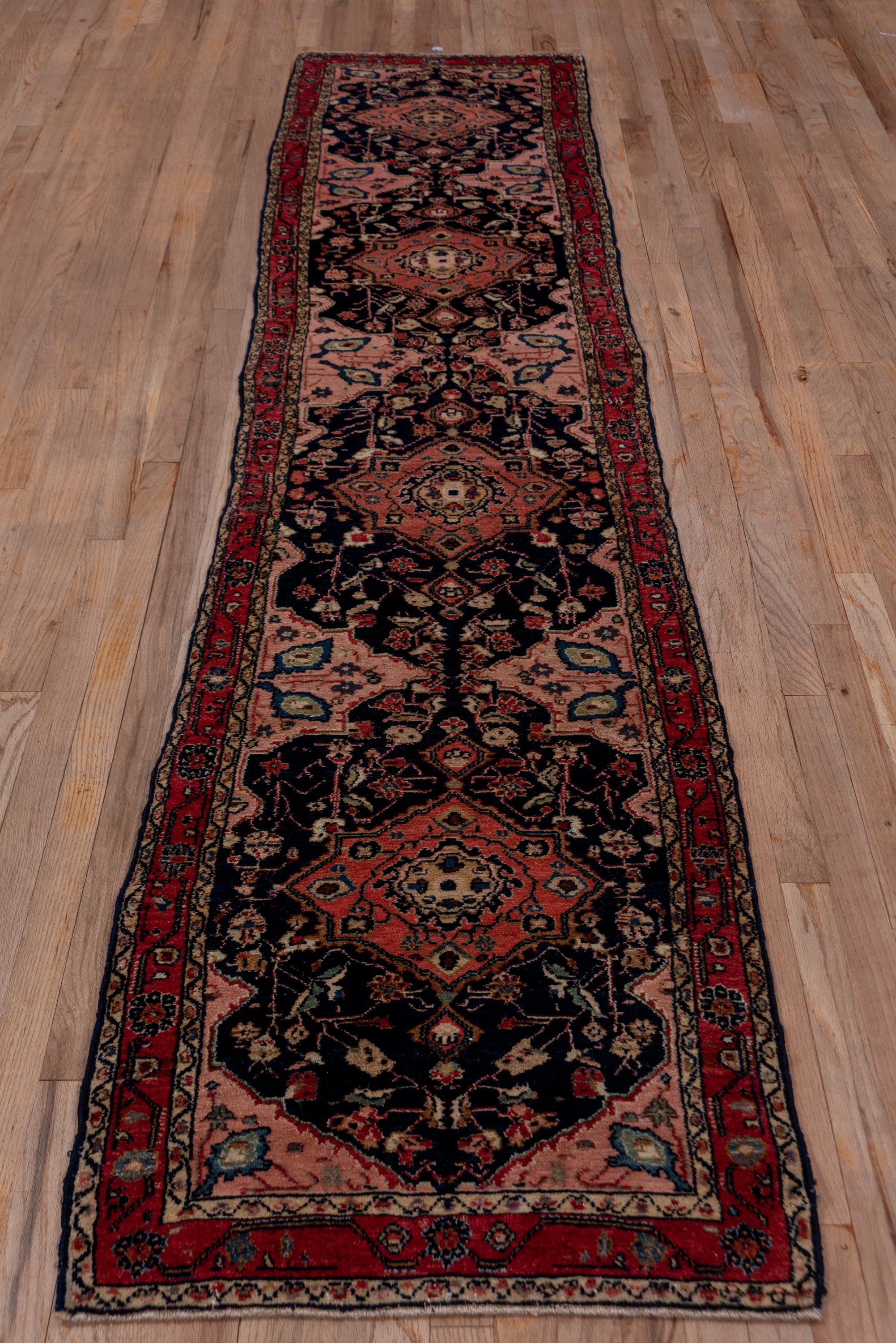 2' x 10' one-of-a-kind handmade antique Malayer runner rug. Color palette: navy, red, rose, ivory, sky blue, sage, camel