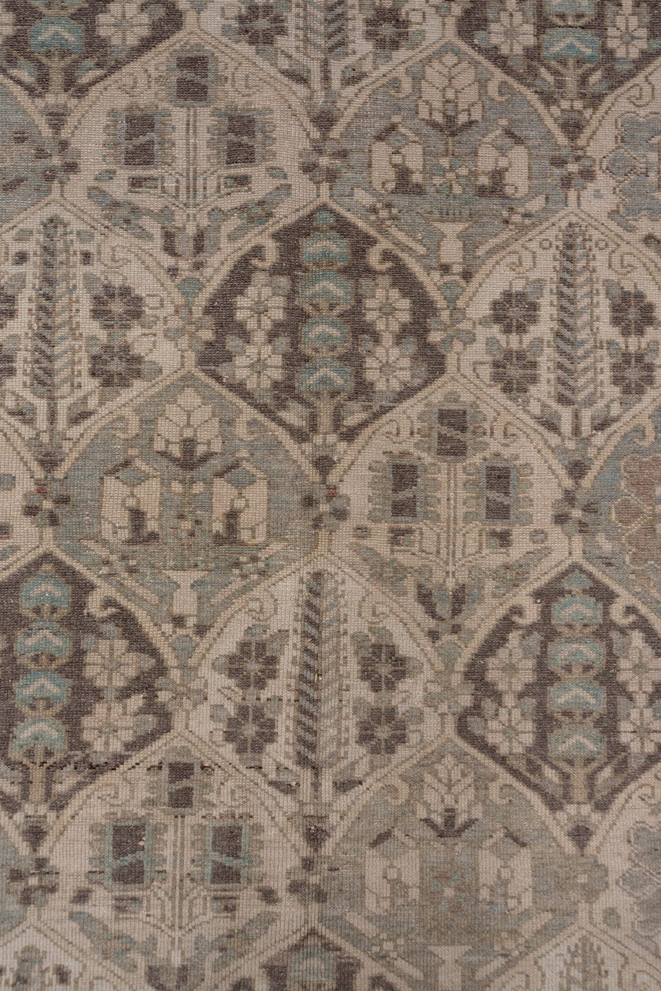 5' x 9' one-of-a-kind handmade antique Baktiary medium size rug. Color palette: taupe, ivory, slate, charcoal, camel