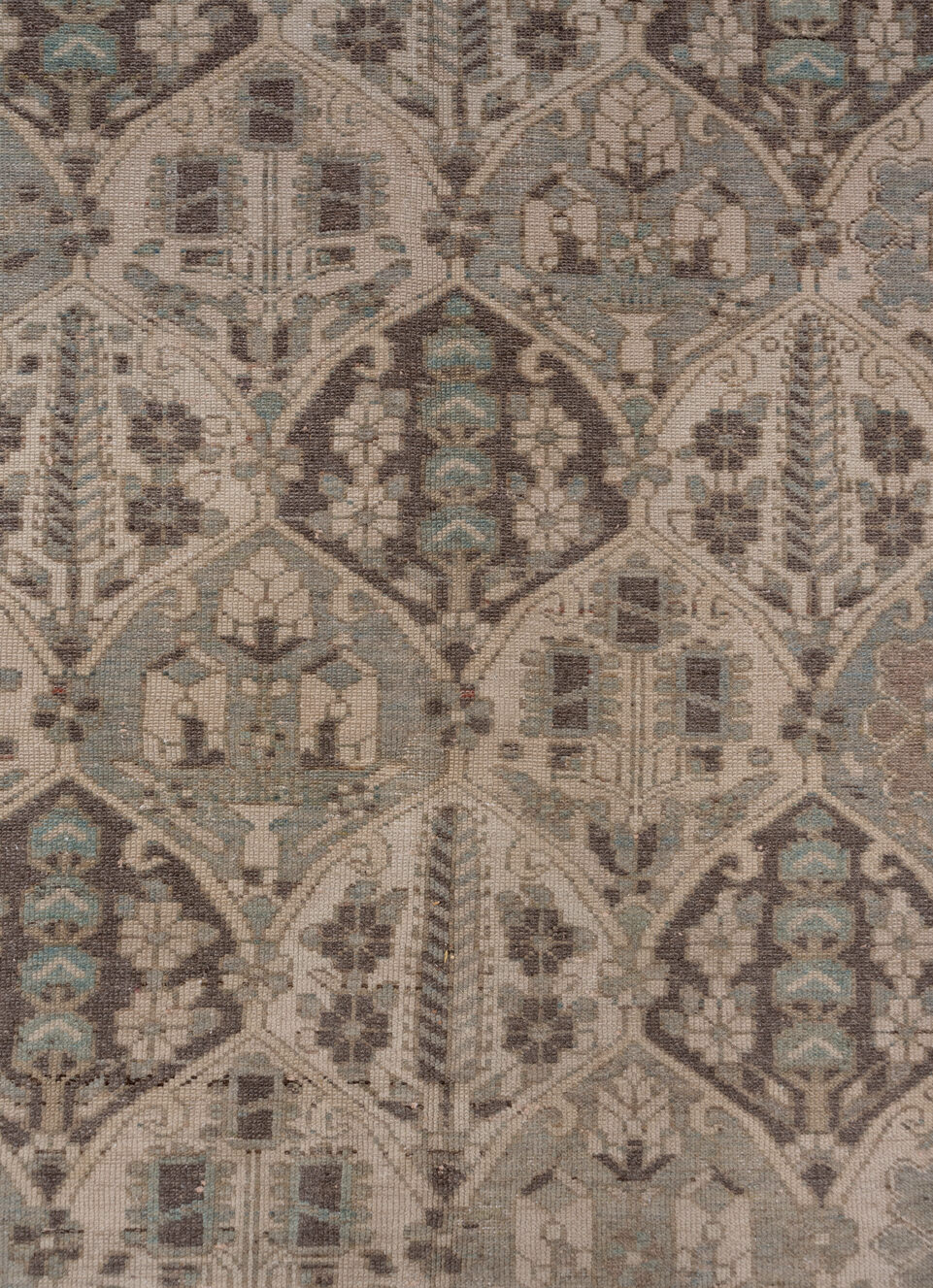 5' x 9' one-of-a-kind handmade vintage Baktiary medium size rug. Color palette: brown, gray, light gray, off-white, pink