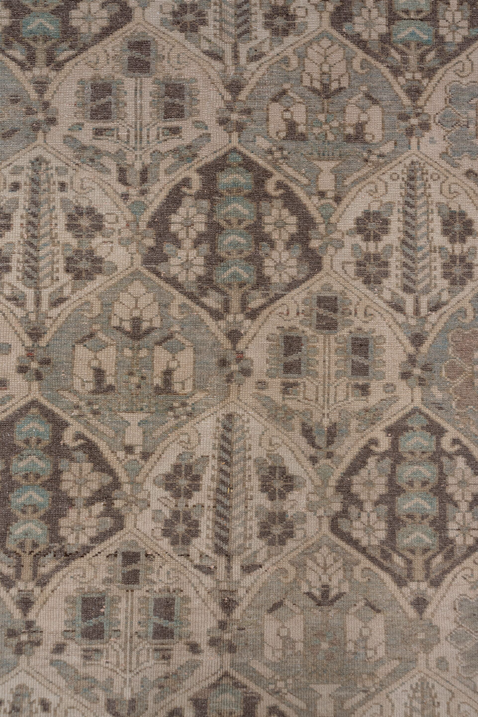 5' x 9' one-of-a-kind handmade vintage Baktiary medium size rug. Color palette: brown, gray, light gray, off-white, pink