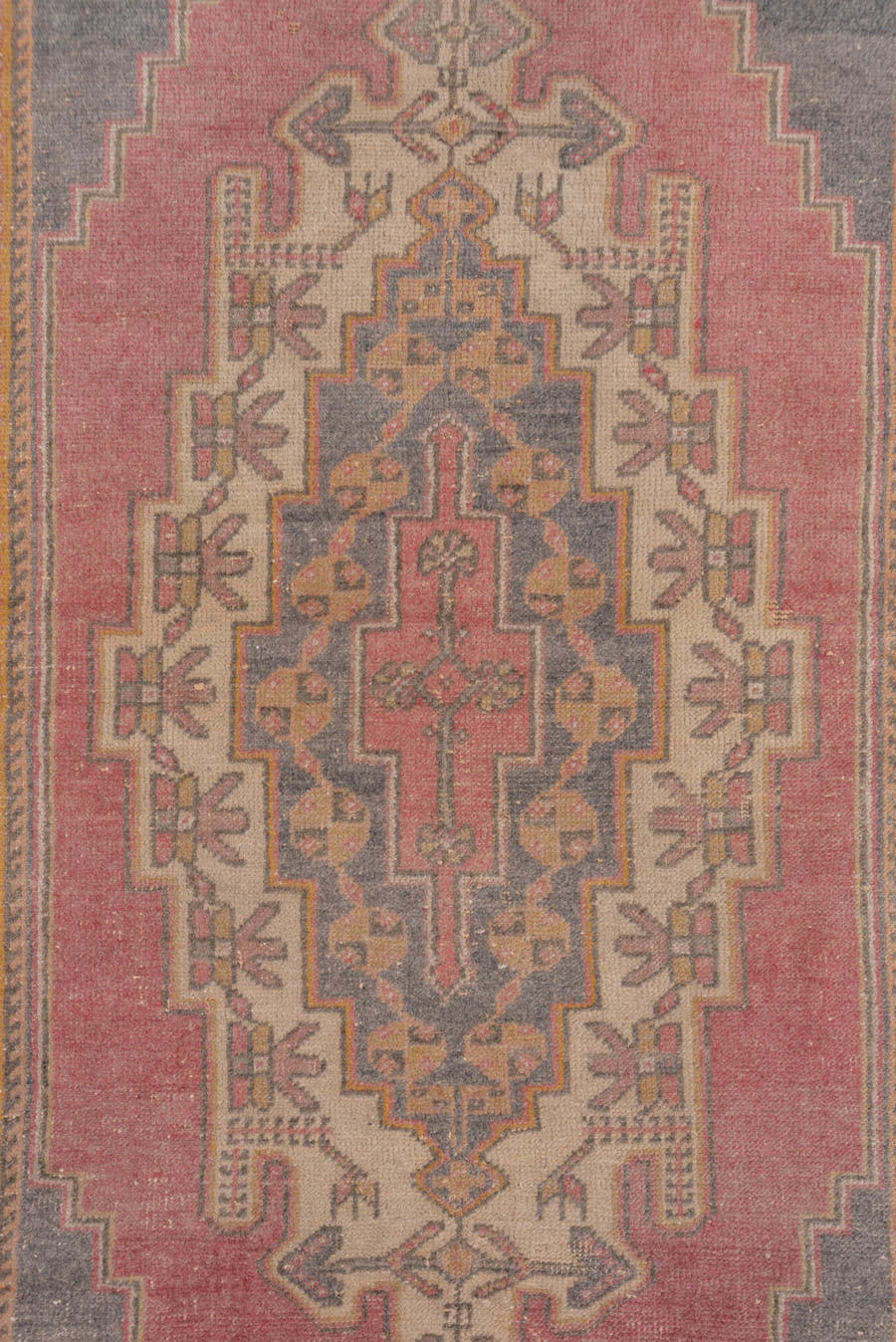 4' x 7' one-of-a-kind handmade antique Oushak rug. Color palette: rose, taupe, slate, ivory, gold, terra cotta, dusty blue