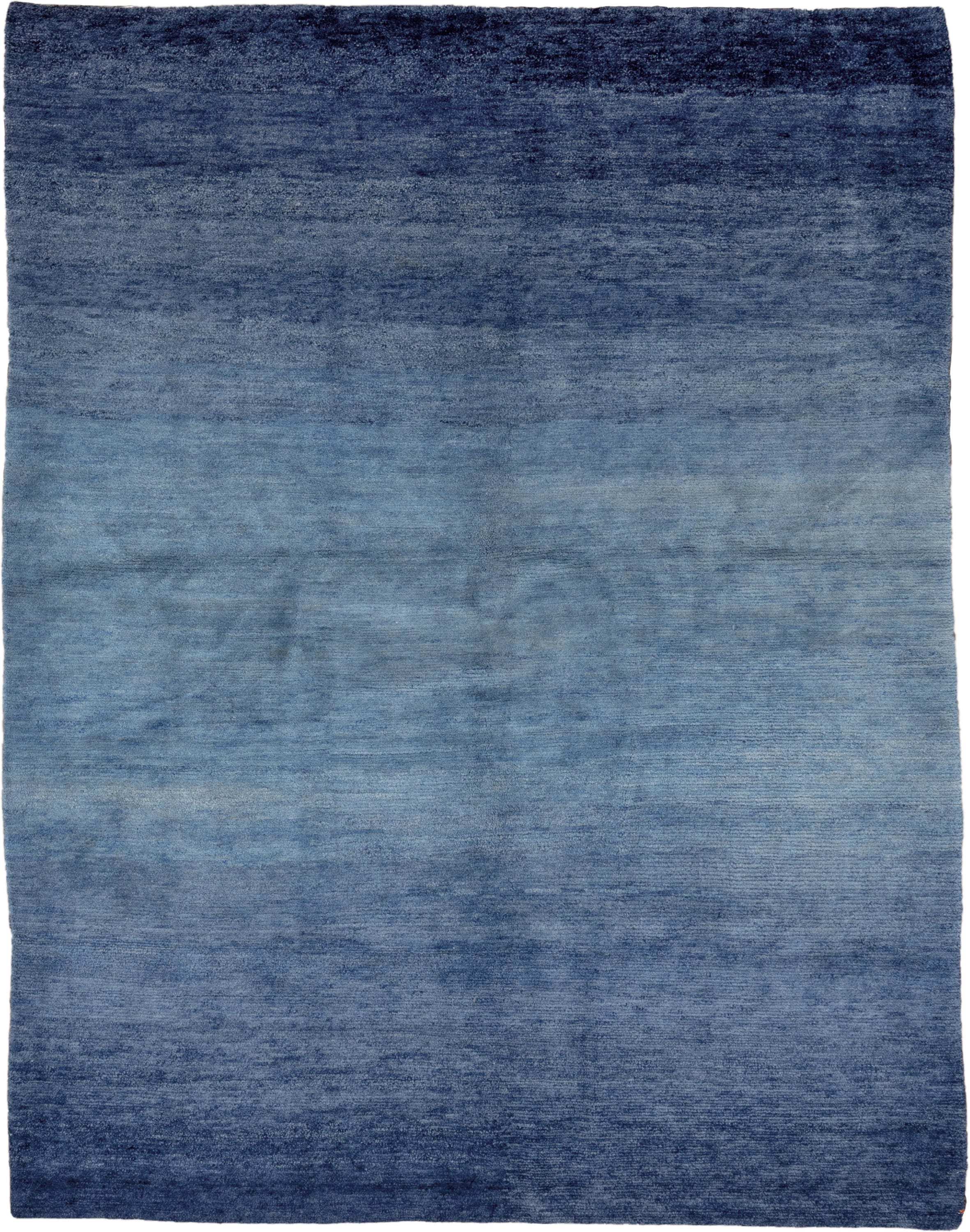 5' x 6' one-of-a-kind handmade vintage Tibetan rug. Color palette: blue, navy, slate, sky blue, gray, light blue