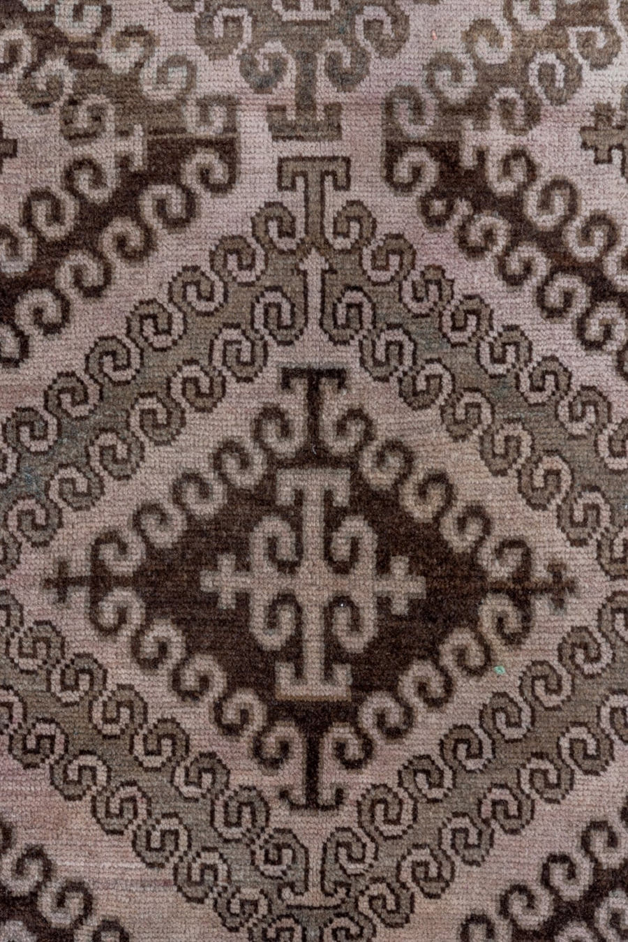 5' x 8' one-of-a-kind handmade antique Belouch medium size rug. Color palette: taupe, brown, charcoal, rose, rust, ivory