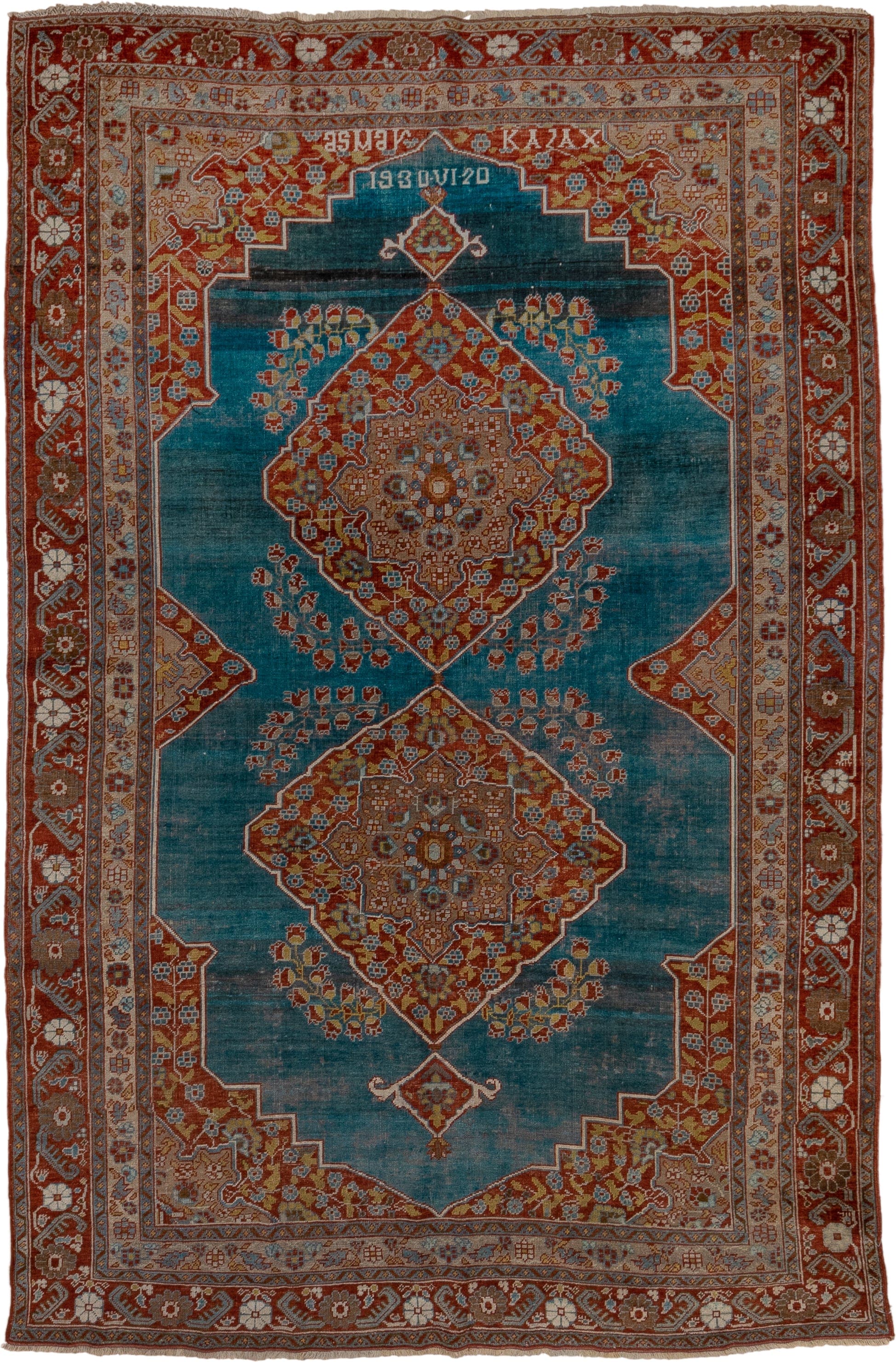 5' x 9' one-of-a-kind handmade antique Karabagh medium size rug. Color palette: turquoise, rust, ivory, terra cotta, gold