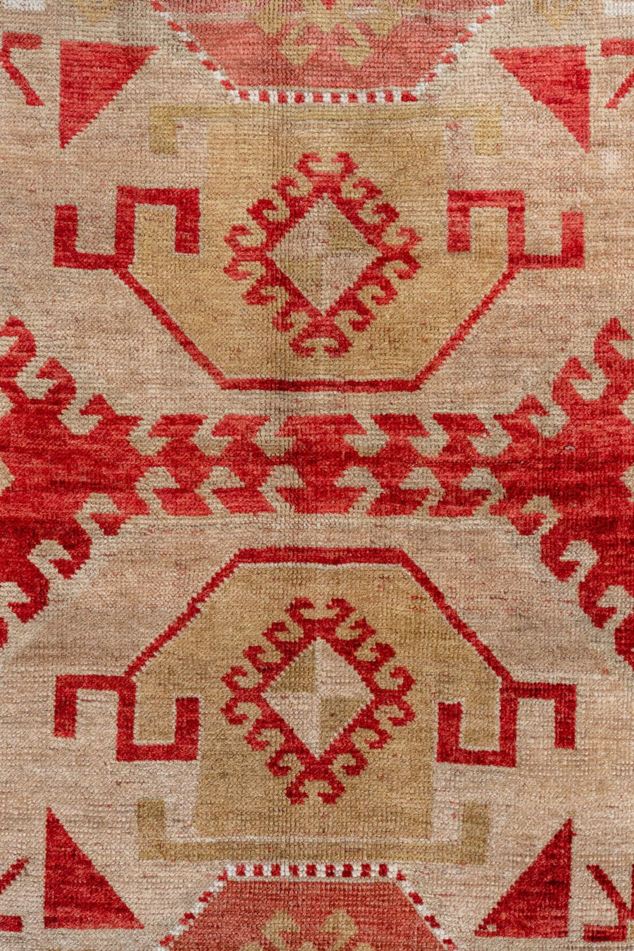 4' x 7' one-of-a-kind handmade antique Caucasian rug. Color palette: rust, ivory, camel, rose, terra cotta, terracotta