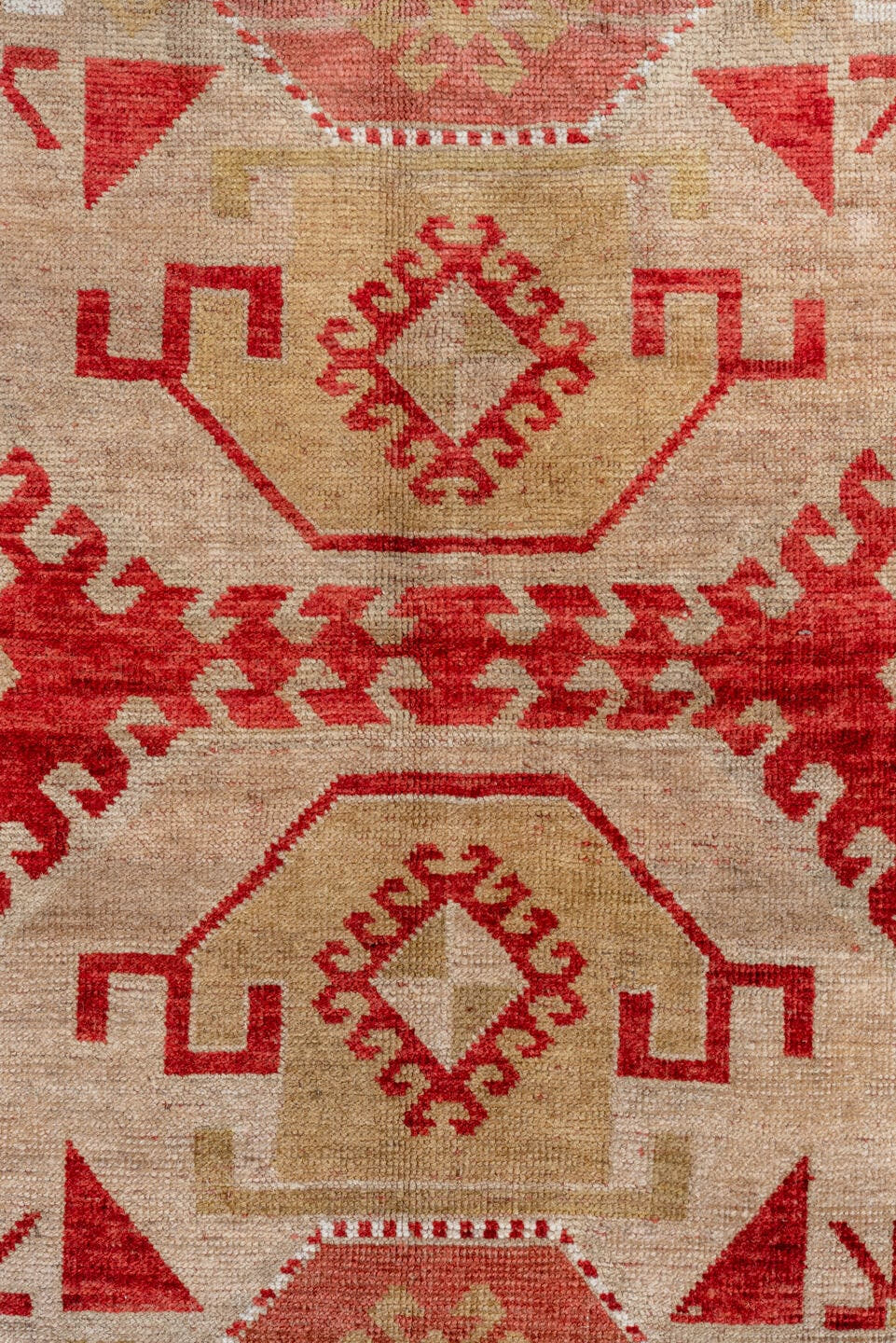 4' x 7' one-of-a-kind handmade antique Caucasian rug. Color palette: rust, ivory, camel, rose, terra cotta, terracotta