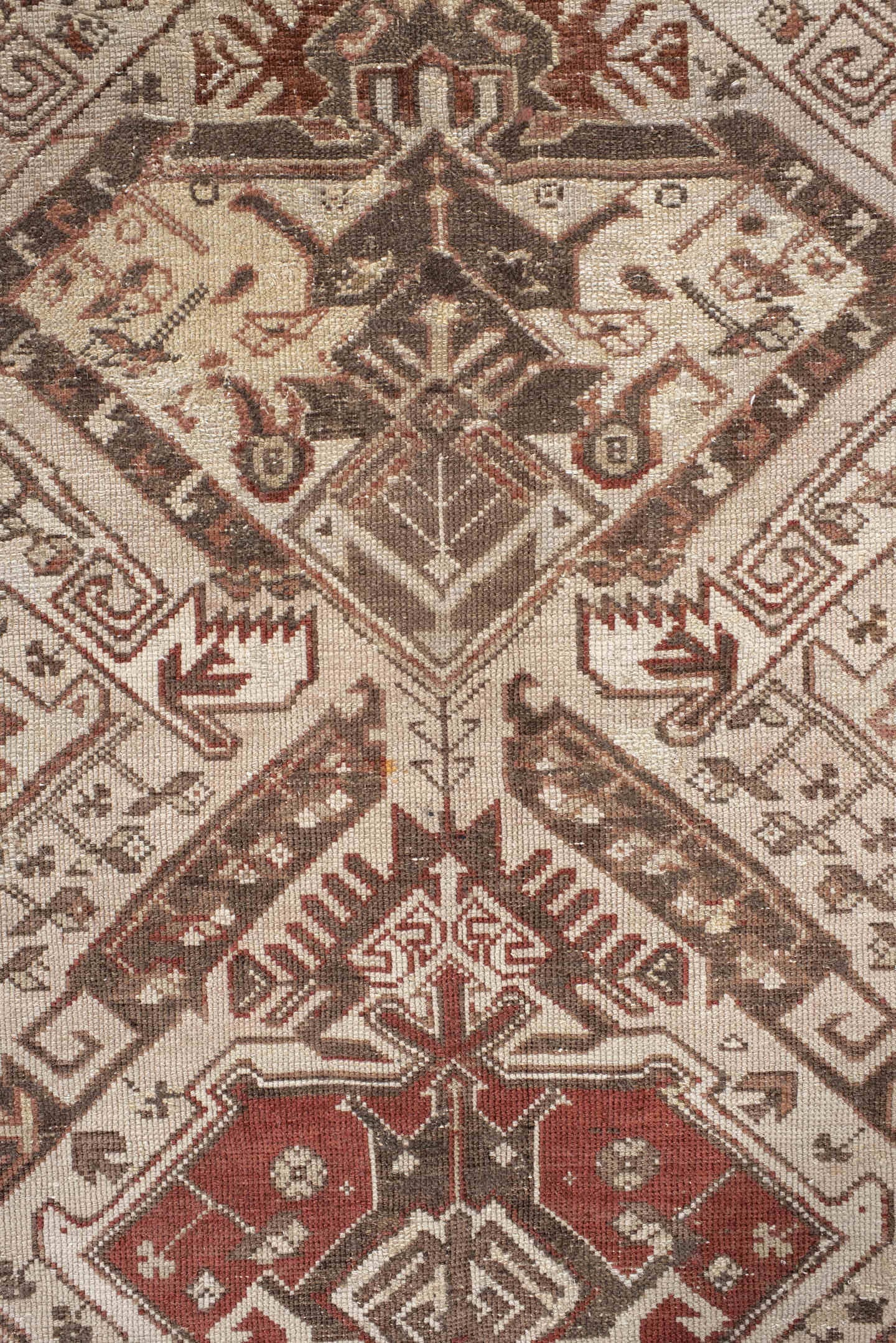 5' x 10' one-of-a-kind handmade vintage Caucasian medium size rug. Color palette: ivory, taupe, brown, rust, camel, rose