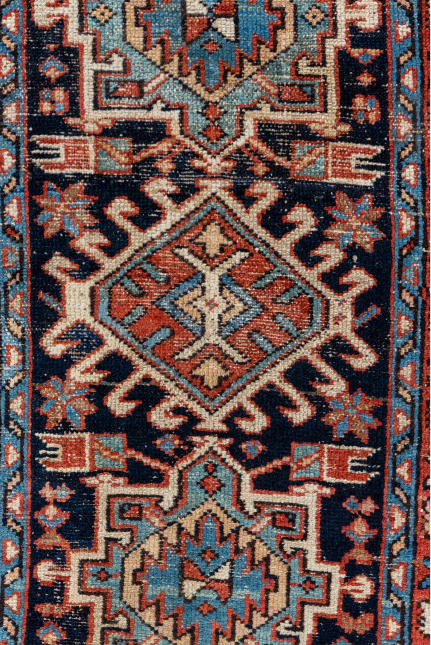 2' x 4' one-of-a-kind handmade antique Karaje small size rug. Color palette: rust, navy, ivory, sky_blue, camel, slate