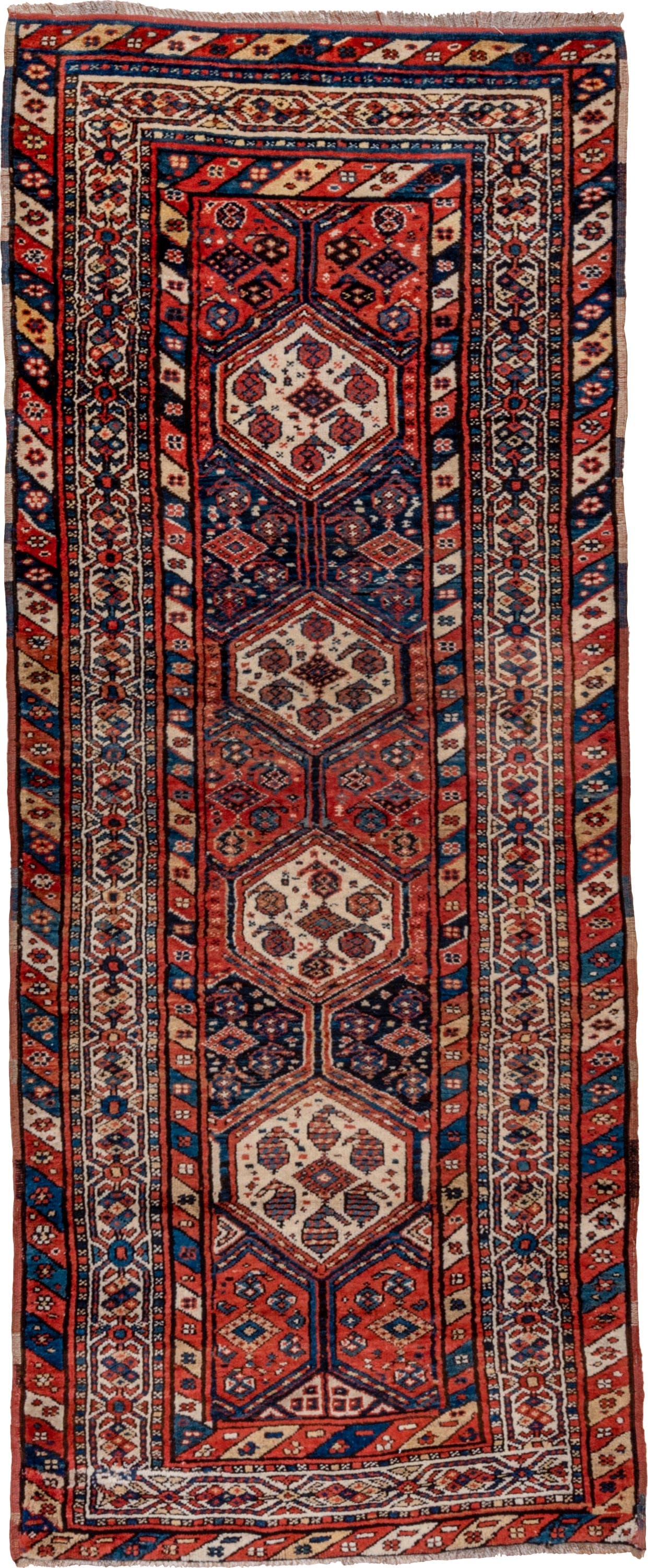 3' x 9' one-of-a-kind handmade antique NW Persian runner rug. Color palette: rust, indigo, ivory, navy, terra cotta, camel