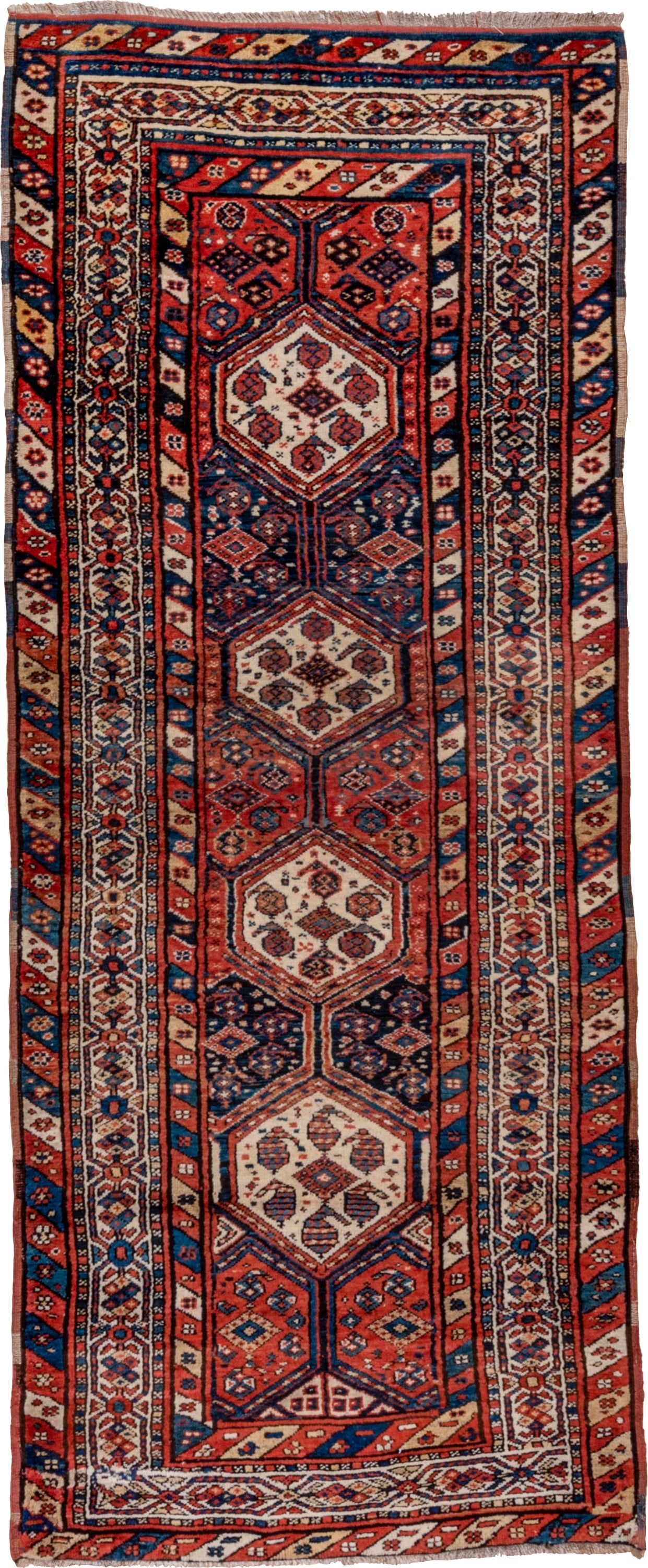 3' x 9' one-of-a-kind handmade antique NW Persian runner rug. Color palette: rust, indigo, ivory, navy, terra cotta, camel