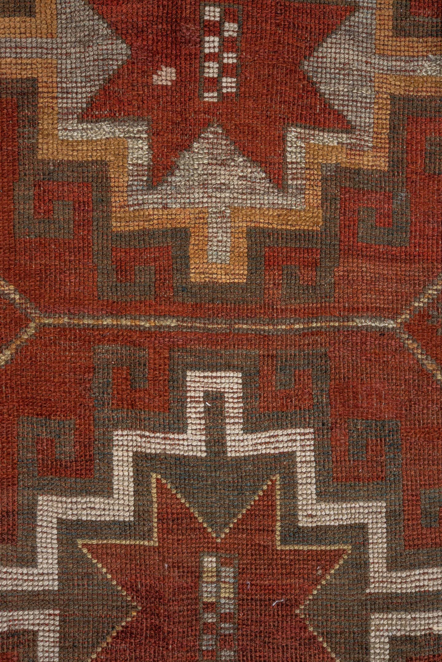 3' x 9' one-of-a-kind handmade antique Caucasian runner rug. Color palette: rust, ivory, brown, taupe, camel, gold, slate
