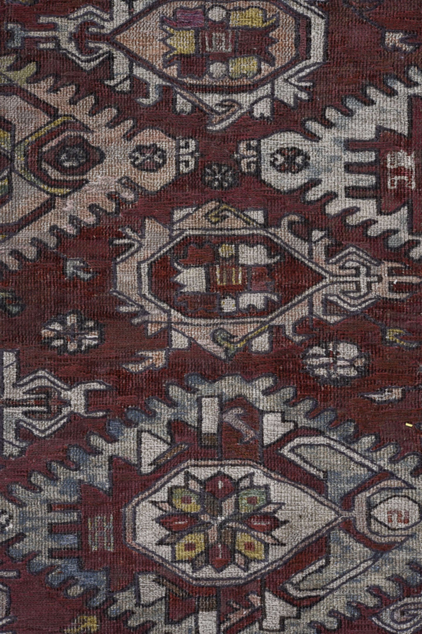 7' x 9' one-of-a-kind handmade antique Sumak rug. Color palette: rust, ivory, slate, sage, gold, charcoal, camel, terracotta
