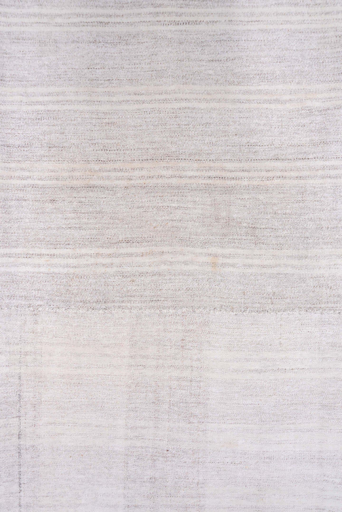 7' x 9' one-of-a-kind handmade vintage Flatweave rug. Color palette: ivory, cream, taupe, beige, light gray, gray