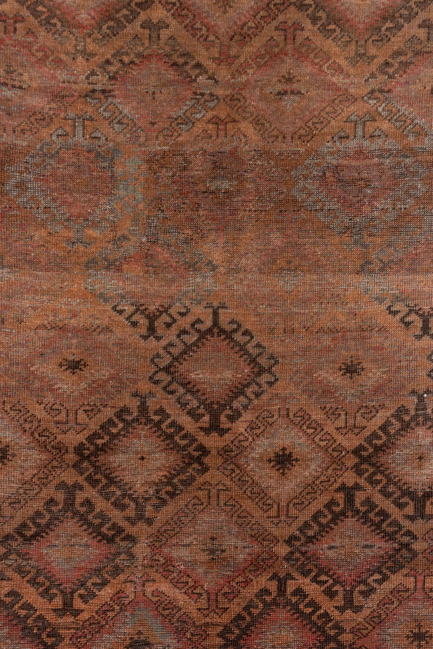 6' x 12' one-of-a-kind handmade antique Belouch large size rug. Color palette: rust, brown, charcoal, taupe, rose, slate
