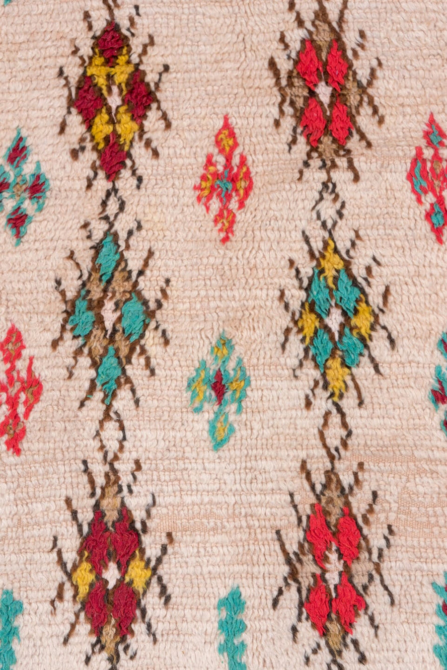 3' x 7' one-of-a-kind handmade vintage Moroccan rug. Color palette: ivory, crimson, turquoise, brown, gold, taupe, red, teal