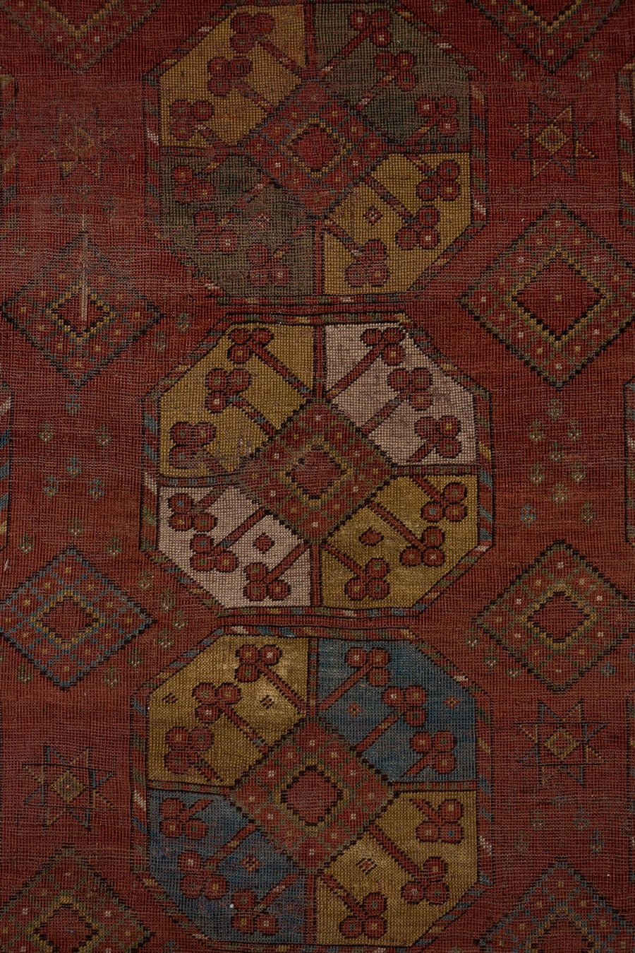 7' x 11' one-of-a-kind handmade antique Afghan large size rug. Color palette: rust, terra cotta, camel, ivory, slate blue