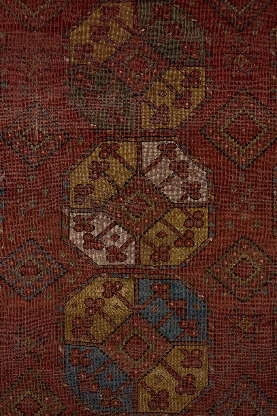 7' x 11' one-of-a-kind handmade antique Afghan large size rug. Color palette: rust, terra cotta, camel, ivory, slate blue