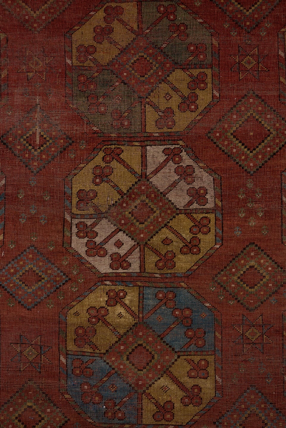 7' x 11' one-of-a-kind handmade antique Afghan large size rug. Color palette: rust, terra cotta, camel, ivory, slate blue