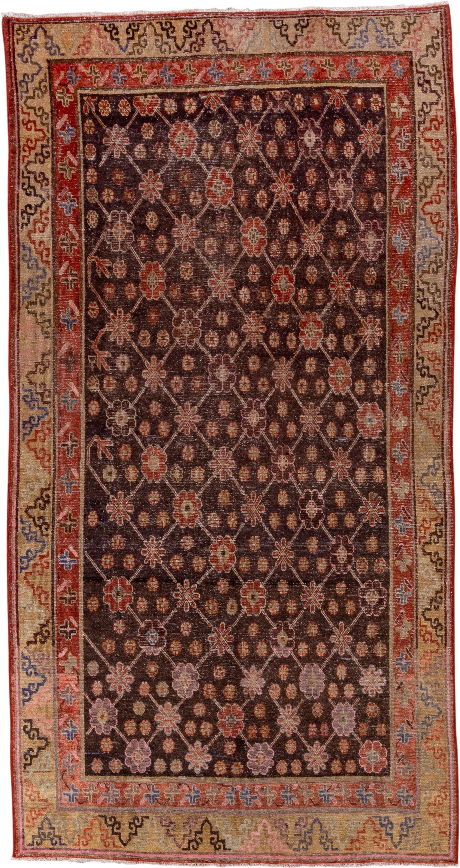 4' x 8' one-of-a-kind handmade vintage Khotan rug. Color palette: brown, rust, camel, ivory, rose, blue, charcoal