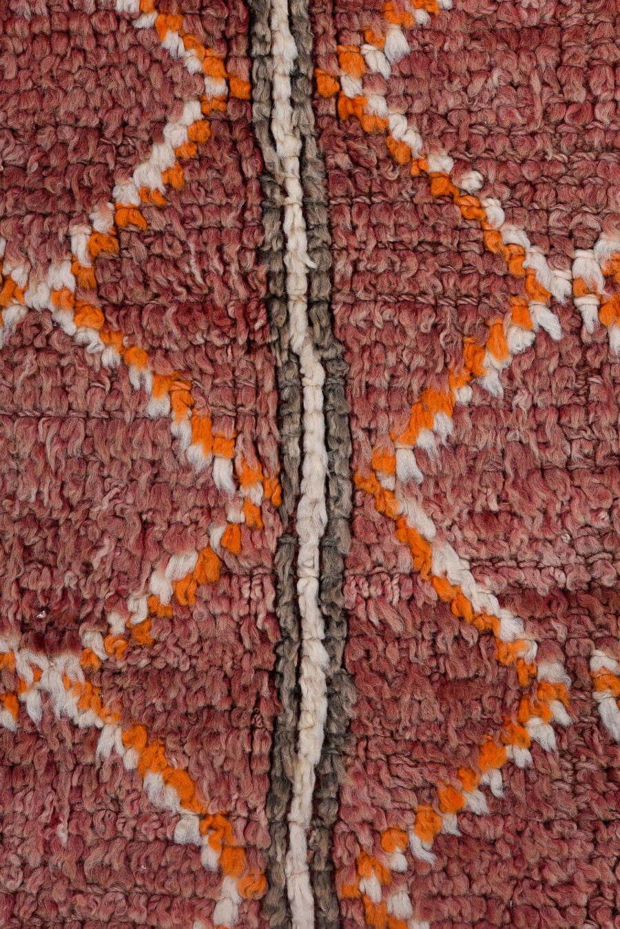 4' x 10' one-of-a-kind handmade vintage Moroccan runner rug. Color palette: rose, mauve, charcoal, ivory, saffron, taupe