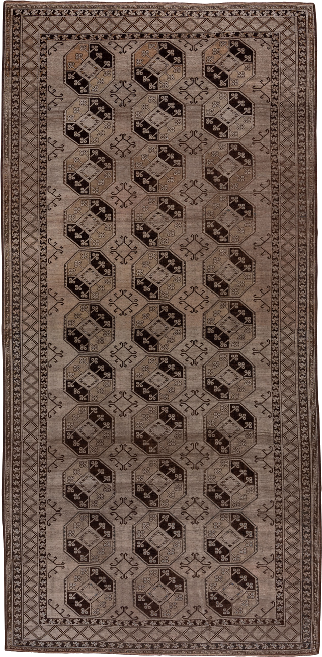 7' x 15' one-of-a-kind handmade vintage Afghan rug. Color palette: black, brown, gray, light gray, pink