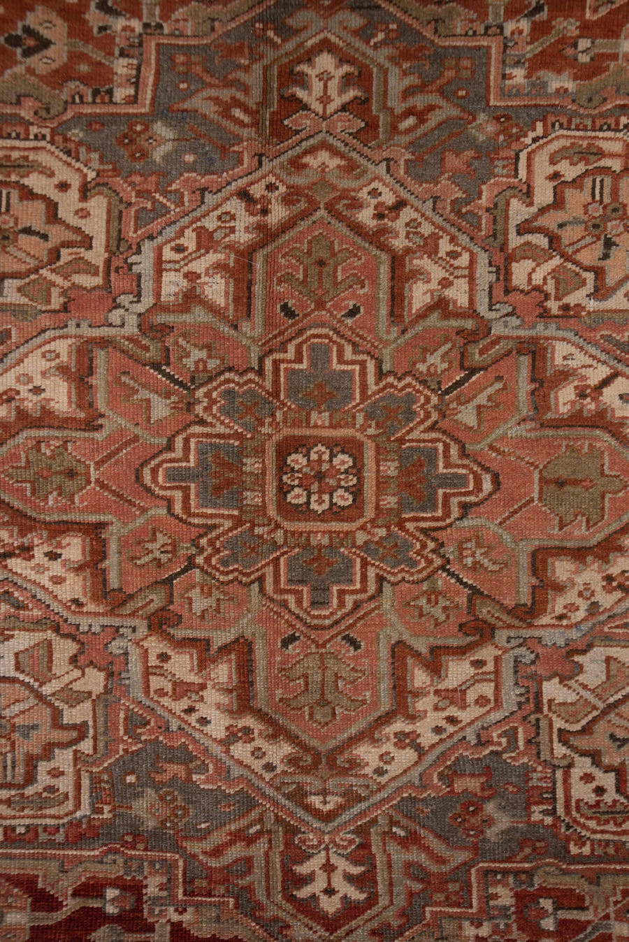 9' x 12' one-of-a-kind handmade vintage Heriz large size rug. Color palette: rust, terracotta, ivory, slate, taupe, brown