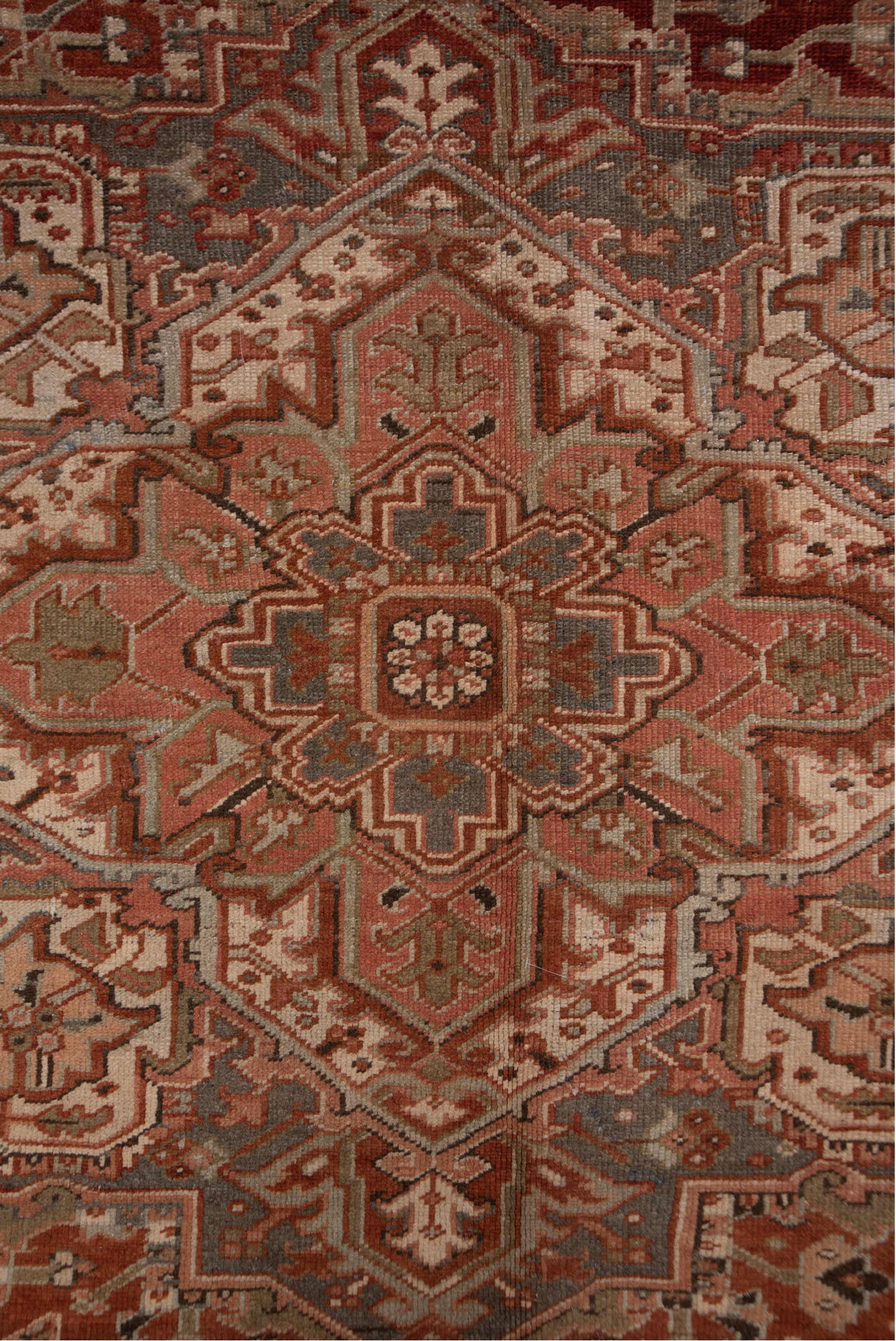 9' x 12' one-of-a-kind handmade vintage Heriz large size rug. Color palette: rust, terracotta, ivory, slate, taupe, brown
